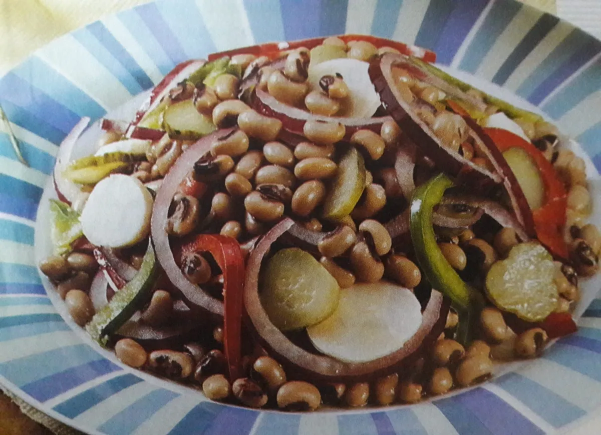 Polvo em Polme com salada de feijão- frade